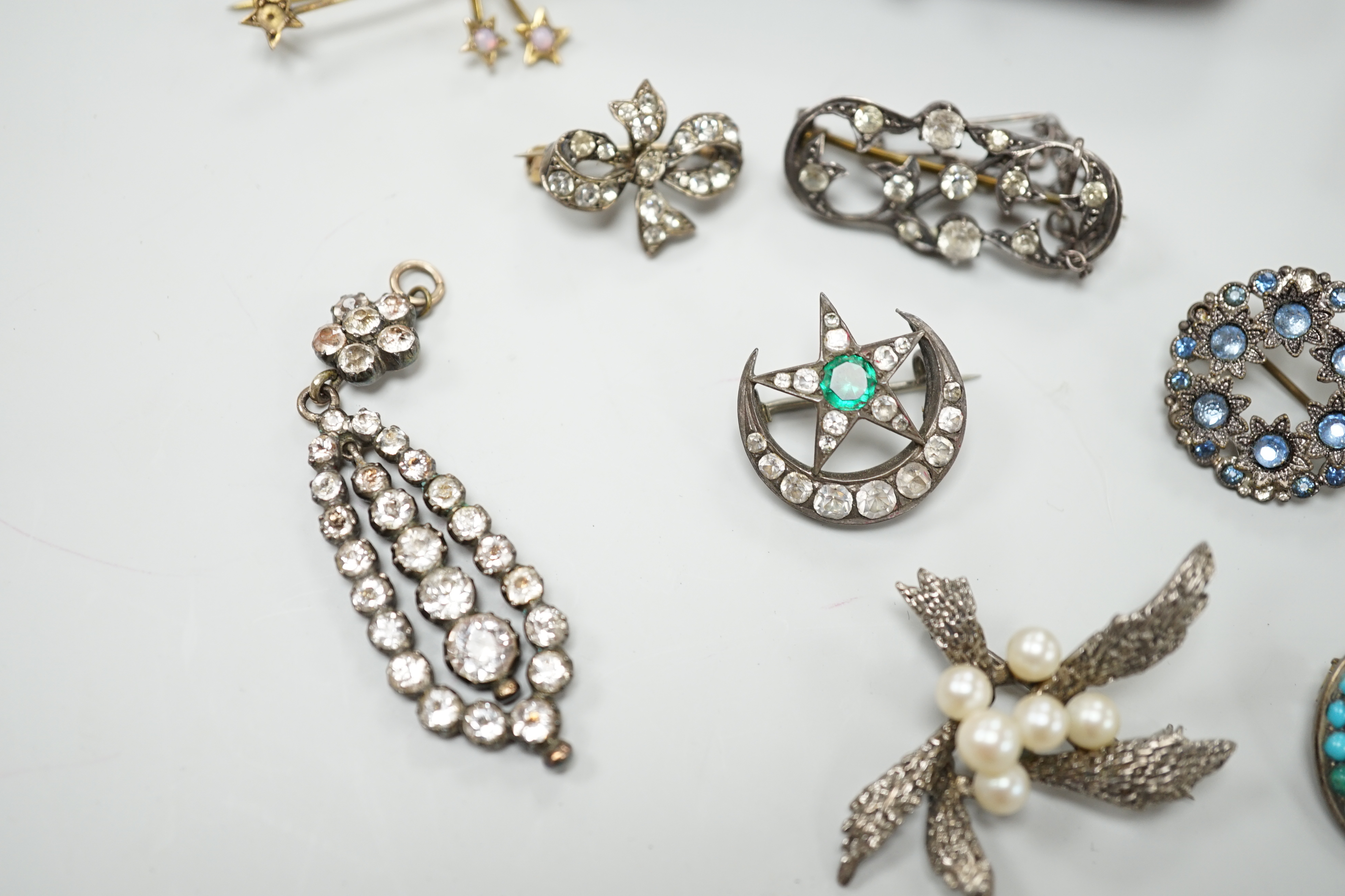 A group of mainly paste set jewellery including a pair of 9ct gold, silver and paste drop earrings and an opal set constellation brooch